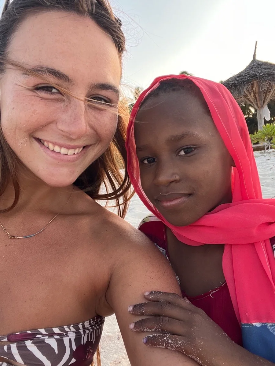 A traveler and young local friend in Zanzibar